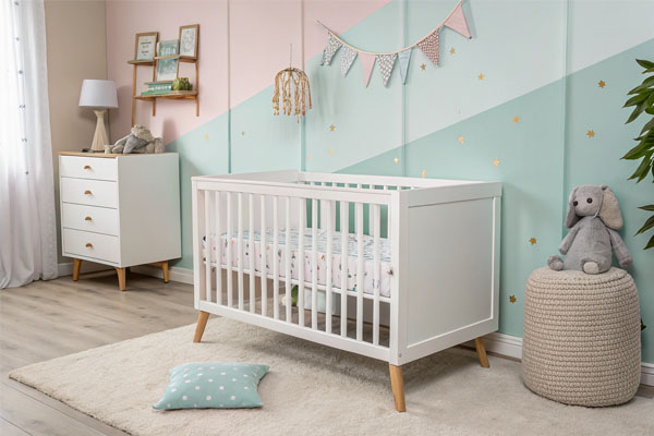 A beautiful, modern, and safe baby crib in a nursery