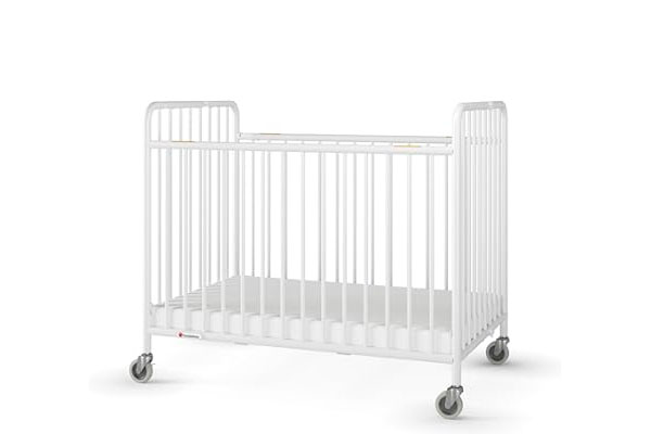A stack of clean, folded cribs in a hotel storage room