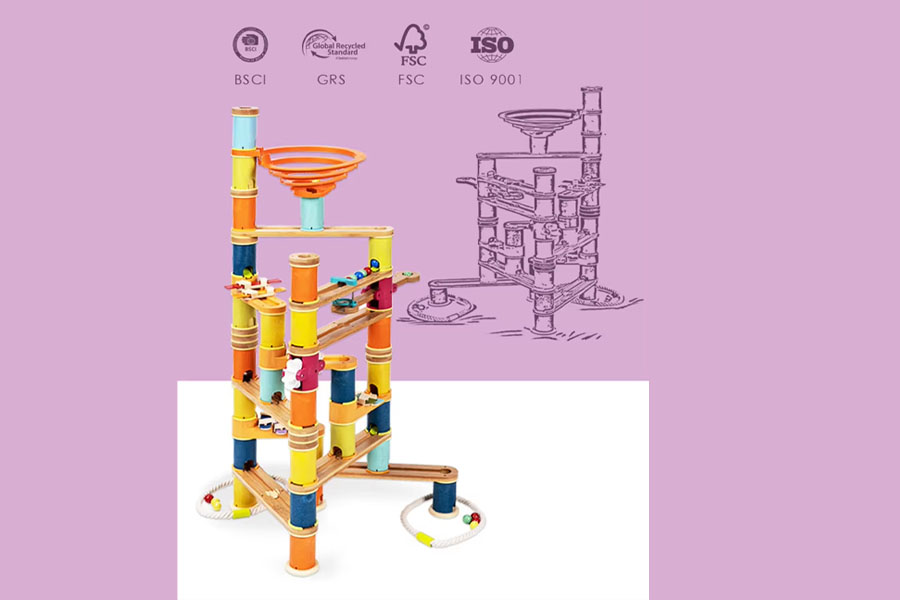 A professional therapist using a wooden marble run with a child in a therapy session